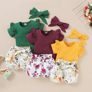 Bebek Giysileri Kız Çiçek Romper Setleri Kısa Kollu Katı Tops + Çiçek Baskı Şort + Yay Bantlar 3 adet / takım Butik Çocuklar Kıyafetler M2111