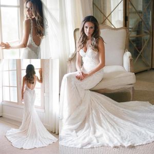 Sexiga Lace Mermaid Bröllopsklänningar Spaghetti Straps Beaded Crystals Backless Court Tåg sommarstrand Bröllop Bröllopklänningar Robes de Mariée