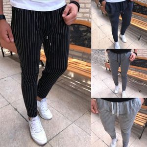 Spot trend Pants European Spring and Autumn fashion striped pocket drawstring casual pants support mixed batch