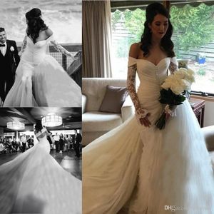 Schulterfreie Meerjungfrau-Brautkleider mit Überrock 2019 Sexy schiere lange Ärmel Brautkleider vorne geteiltes Hochzeitskleid nach Maß