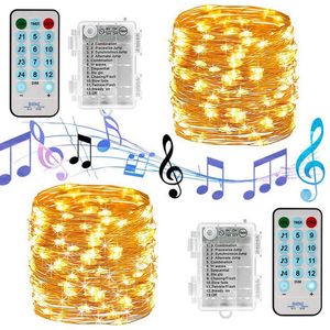 Multi Color String Lights A batteria 33ft 100LEDs 8 Music Mode Illuminazione natalizia con telecomando per Party Xmas Wedding