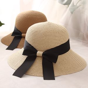 夏の女性帽子韓国の弓リボンフィッシャーマンハットビーチ太陽の潮の屋外休暇の日差しの藁帽子wcw841