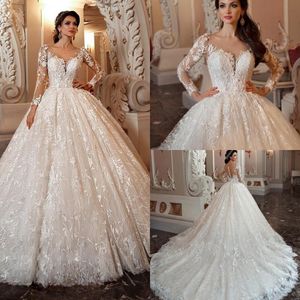 Gorgeous Long Sleeves Ball Gown Wedding Dresses 2020 Arabic Sheer Jewel Neckline Illusion Button Back Embroidered Lace Bridal Gowns AL4171