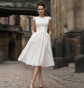 Krótkie suknie ślubne 2021 Czapka Rękaw Backless Suknie Ślubne Stain Bride Dresses 2020 Wedding Guest Dresses Custom