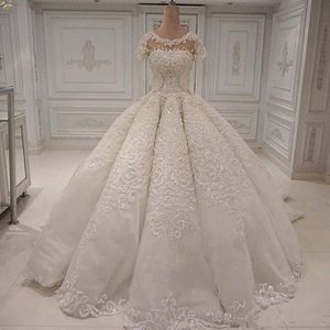 Luxury Gorgeous Lace Ball Gown Wedding Dresses 2019 Puffy Short Sleeve Jewel Neck Saudi Arabia Ivory Wedding Dress Bridal Gowns