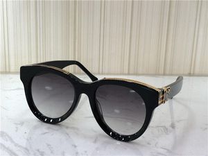Luxury-New Fashion Designer Solglasögon 2369 Charmig kattögonram Populära stil för kvinnor Toppkvalitet Sälj UV400 Skydd Eyewear