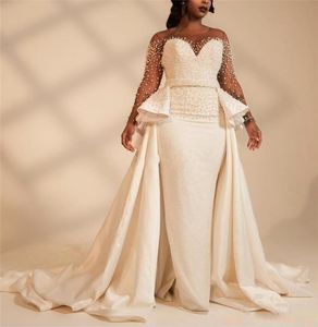 Gorgeous Pearls Overskirt Wedding Dresses Sheer Bateau Neck Long Sleeves Bridal Gowns A Line Sweep Train Sequined robe de mariée