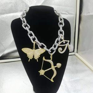 Mens iced out hip hop chain pendants lyx designer smycken män diamant halsband mycket stor hänge fjäril cupid s arrow rapper kubansk länk