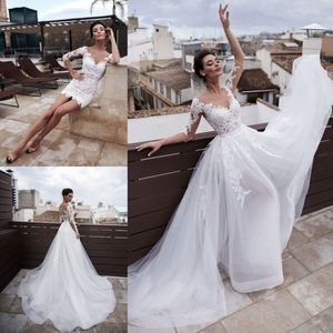 Niesamowita plażowa koronkowa suknie ślubne z odłączanym pociągiem Sheer Bateau Neck A Line Długie Rękawy Suknie Bridal Buttons Powrót Robe de Mariée