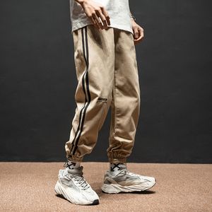 Heren jeans Mode Streetwear Men Losse pasvorm Side Stripe Casual Cargo Broek Hombre Army Green Khaki Hip Hop Joggers