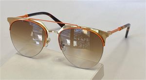 Design Sunglasses Cat Eye Metalowa Pół Ramki Modne i Wszechstronne Styl UV400 Ochrona obiektywu Okulary Najwyższa jakość