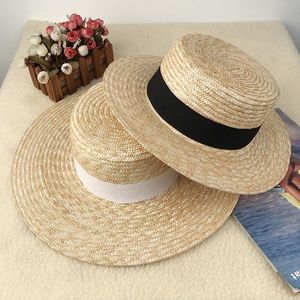 круглая соломенная шляпа оптовых-Широкие шляпы Breim Hats Sun Caps ленты круглая плоская верхняя соломенная пляжная шапка для матери Дети Панама Летний солнцезащитный крем