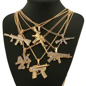 arma de steampunk venda por atacado-Luxo designer colar moda revólver uzi arma pingente colares mulheres homens hip hop jóias steampunk bling strass ouro longo colares