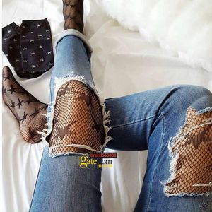 hohle sterne großhandel-Socken Mode coole Star gedruckt Fischnetz Strumpfhosen aushöhlen sexy Mesh Strumpfhosen Punk Muster Strumpfhosen Schwarze Frauen