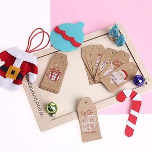 yılbaşı kağıt çanları toptan satış-Noel Süslemeleri DIY Retro Tarzı Kraft Kağıt Etiketi Kar Tanesi Noel Ağacı Noel Baba Hediye Çan Etiketleri Nimet Kartları Malzemeleri