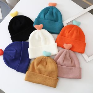 warme herzen großhandel-Ins koreanischer Art Babywollkappe Herbst und Winter Baby Mädchen schöne herzförmige super nette Monate warme gestrickte Hut