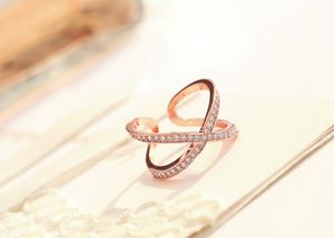 проложить х кольцо оптовых-Новый дизайн X формы крестовые кольца для женщин мода посеребренные пары свадьба микросистемы CZ кристалл роскошные украшения