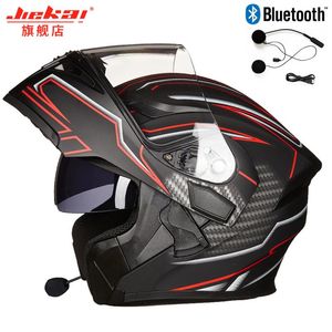 casco integral parasol al por mayor-Cascos de la motocicleta Moda Bluetooth Seguro Flip Up Casco Motocross Cara completa con el Sol Interno Visera Cuernos