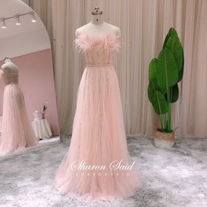 penas vestido de noiva corar venda por atacado-Dubai blush vestido de noite rosa com beading de penas ver através de mulheres vestidos de festa de casamento elegante vestidos de baile formal longo