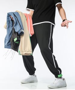 ankle pants for men оптовых-Мужские брюки карандашные брюки спортивные лодыжки комбинезоны пробежки цветов модные спортивные штаны полосы панолируют Jogger азиатский размер M XL рабочая эластичность CR