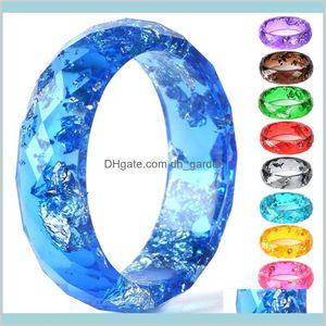 Band Ringar Smycken Drop Leverans Färger Safir Blue Faceted Eco med Gold Sier Flakes Resin Ring för kvinnor Män FWXID