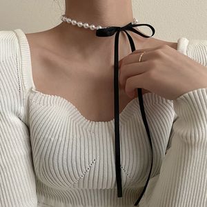 pearl-chokers. großhandel-Choker Halsketten Anhänger Süße schwarze Samt Bogen Doppelkette Einfache Bowknot Plüsch Perle Schlüsselbein Kettenkragen Für Frauen Dame Schmuck