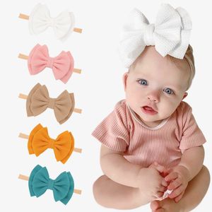 MQSP Gratis DHL Ins Färger Baby Headband Solid Big Bow Knot Toddler Hårband Boutique Quality Nylon Spädbarn Headwrraps