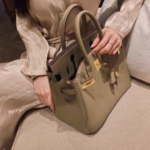 bao handtasche großhandel-2021 Neue Designer Mode Tasche Aima Litchi Muster Platin Bao Shi Leder Kuh Togo Handtasche Große Kapazität Frauen Taschen