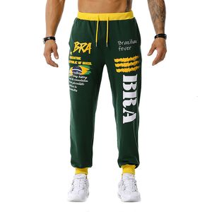 Wholesale football sweatpants resale online - Men s Pants Flag Print joggers Outdoor Sports trousers Fitness Hip Hop Sweatpants Football Training Loose BVQ