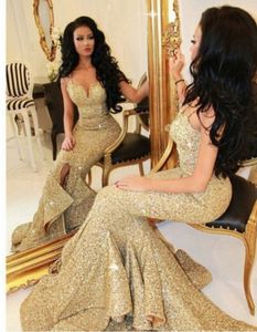 Nowy projektant Mermaid Gold Prom Sukienka z szczelinami Koronki Aplikacje Otwórz Back Cekiny Suknie Wieczorowe Pagewne Suknie Bling Front