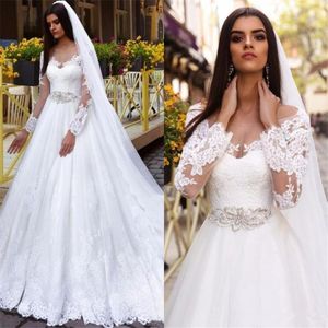 dubai kaftan abaya Illusion Long Sleeves Beaded Long Wedding Dress Beading Sash White Sheer Neckline Lace Applique custom made Bridal Gowns