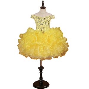 chicas impresionantes al por mayor-Impresionantes vestidos de concurso de niñas amarillas Toaddle Magcake Ruffles Crystal Bling Rhinestones Organza Off Hombro Flores Vestido