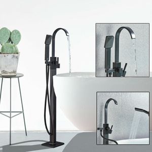 Wholesale US Shipping Oil Rubbed Brozne Floor Mounted Bathroom Tub Filler Bathroom Tub Faucet FreeStanding Hand Shower Mixer Tap