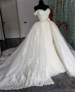 Nyanlända sjöjungfru bröllopsklänningar med avtagbar kjoltåg från axel Sweetheart Neck Fishtail Elfenben Lace Luxury Bridal Gowns