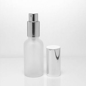 Botella de perfume de vidrio redondo con esmerilizado de 30 ml 1 oz recargador de vidrio redondo recargable con atomizador de aluminio Cosmética Cosmética Botella de botella de botella para viajar wpmlo