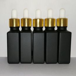 30 ml de vidrio esmerilado negro reactivo pipeta cuentagotas botellas cuadradas aceite esencial botella de perfume aceites de humo e botella líquida con tapa de oro Gfbkv