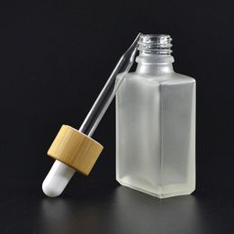 30 ml Botellas cuentagotas de vidrio transparente / esmerilado Pipeta de reactivo líquido Botellas de perfume de aceite esencial cuadradas Aceite de humo e botellas de líquido Bambú Hlvd