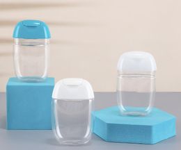 Bouteilles de désinfectant pour les mains de 30 ml en plastique PET demi-rond bouteille à capuchon rabattable enfants portent un conteneur de désinfectant SN4695
