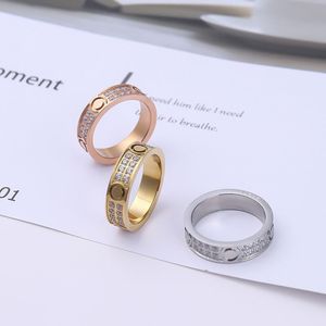 Amantes de los anillos de acero de titanio 316L Tamaño de los anillos para mujeres y hombres Joyas de diseñador de lujo SIN caja