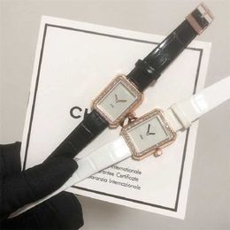 32% KORTING horloge Horloge Mode dames heren quartz uurwerk zwart witte diamant vijand bruiloft montre de luxe D319