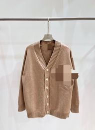 322 2023 marca de primavera mismo estilo suéter de manga corta con cuello en V cárdigan moda mujer ropa de alta calidad para mujer qian28