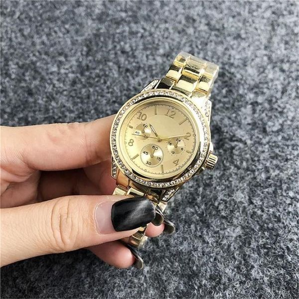 34 mm mode cristal incrusté horloge cadran en acier inoxydable bracelet de montre femmes montres à quartz faux 3 yeux design de mode Women'211H