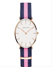 36 mm Imploques pour femmes simples, Quartz HEATS MONTRE LETTRIQUE CHOST CHARDE CHORDS OU NYLON BANDES DE NYLO