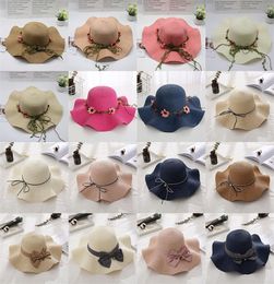 39 style Femme Été Vague Ondulé Bord Chapeau De Paille Chapeau Le Long De La Perle Arc Grand Le Long Caps Coréen Voyage Plage Solaire Chapeaux En Gros de125