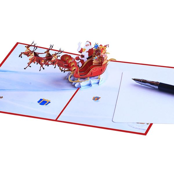 Tarjetas de Navidad en 3D Tarjetas emergentes creativas Fabricantes de fiesta de tarjetas de vacaciones Carry Flying Cart de ciervos para Navidad Año Nuevo