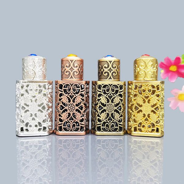 Bouteille de parfum en métal Antique de 3ml, en alliage de Style arabe, bouteille d'huiles essentielles ajourée, flacon compte-gouttes en verre du moyen-orient