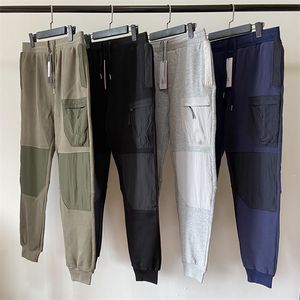 4 couleurs vêtements de créateurs la meilleure qualité CP hommes femmes casual hiver vêtements d'extérieur hip hop pantalons pantalons pour dames avec badge taille asiatique M-2XL