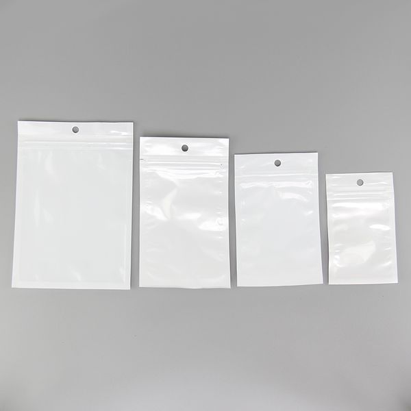 4 tailles de sacs en plastique OPP transparents + blancs refermables au détail en poly pochette d'emballage pour câble de boîtier de téléphone portable