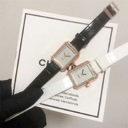 40% KORTING horloge Horloge Mode dames heren quartz uurwerk zwart witte diamant vijand bruiloft montre de luxe D319