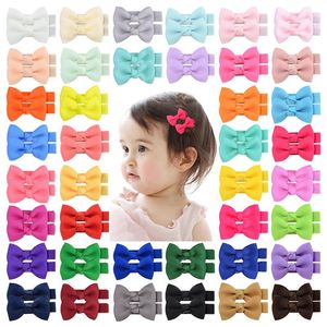 Ruban gros-grain de couleur unie nœud papillon pinces à cheveux pour tout-petits nœuds faits à la main bébé filles Barrettes frange épingles à cheveux accessoires Photo